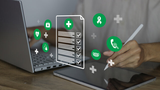 Health insurance concept, healthcare and medical care, life insurance policy being processed on a digital tablet. Features medical icons for heart care, pills, masks, and telehealth services