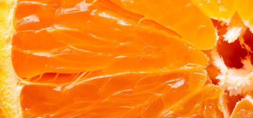 Macro shot of fresh orange pulp texture background,Extreme close-up macro photography of fresh juicy orange fruit pulp. The image highlights the vibrant orange texture, translucent juice vesicles, © banjongseal324