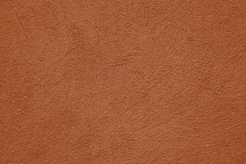 Fototapeta premium peach fuzz pink Wall Texture orange color cement texture background light cement texture Brown cement stucco plaster plastering wall backdrop image Trendy orange color colour