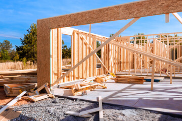 Construction site wooden framing, building materials, tools in during framework