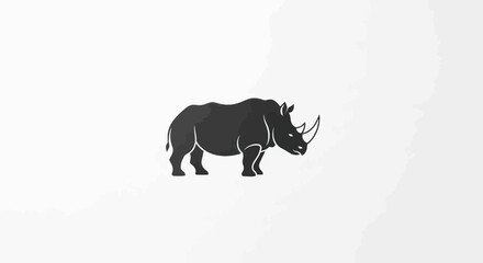Minimalist dark gray rhino silhouette on a light gray background © Korek