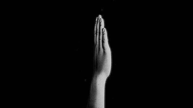 A drag and drop overlay of a looping spinning human hand with alpha.

