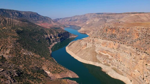 Breathtaking Botan river winds through rugged canyon walls in Turkey
