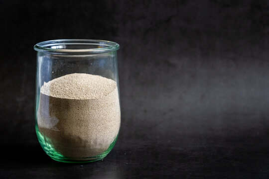 Dry yeast in a glass jar