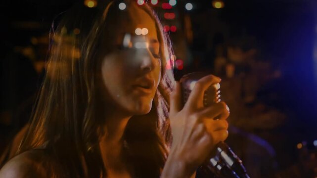 Lighting cue starting lead singer gripping vintage mic, singing to open music, bokeh over face