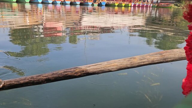 Scenic view from a moving boat at Ram Ghat in Chitrakoot, Madhya Pradesh, on the sacred Mandakini River. This spiritual riverside location is associated with Lord Rama, Sita, and Lakshman.