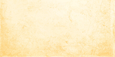 Fototapeta premium Vintage aged parchment with a stained brown grunge texture creates an antique blank page background featuring a rough worn material design on a weathered retro paper canvas