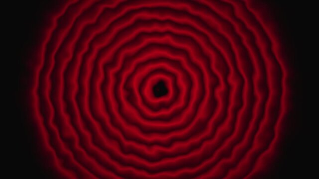 Organic red ring pattern with wavy edges on dark background. Red ring pattern concept. Red ring pattern abstract motion.