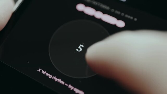 Close-up of finger following pattern to allow payment, Wrong rhythm