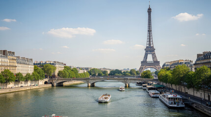 Obraz premium Eiffel tower rising above the seine river in paris with sightseeing tour boats cruising under a stone arch bridge on a sunny day