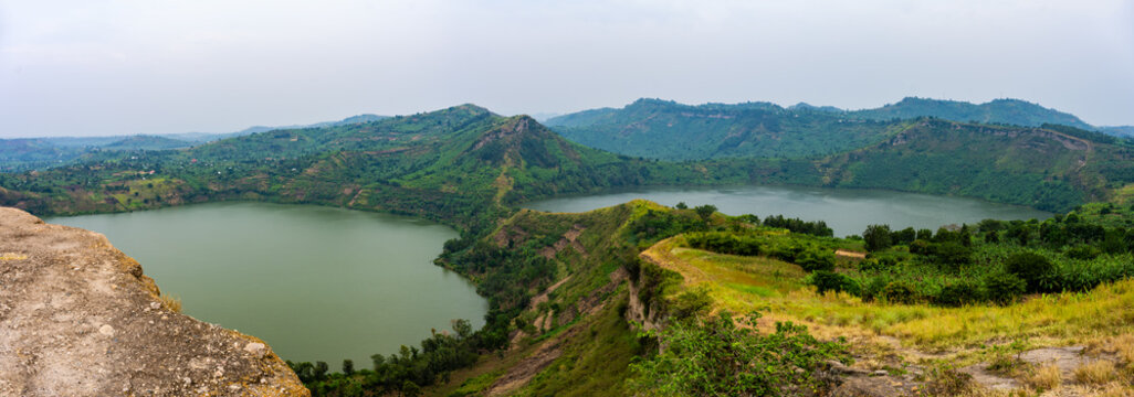 Twin crater lakes and green hills near Lake Nyinambuga in western Uganda