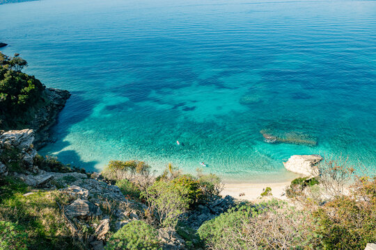 Scenic Coastal View with Turquoise Blue Sea and Clear Sky. Shpella e P&euml;llumbave, Ksamil, Albania.
