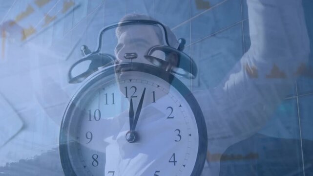 Clock hands near 12, alarm sounding, man turning head, standing, raising arms meeting deadline
