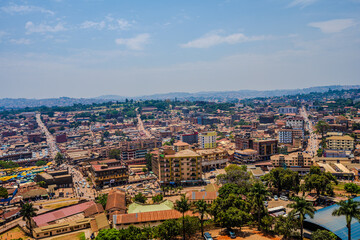 Fototapeta premium Elevated cityscape view over central Kampala with roads and low-rise buildings