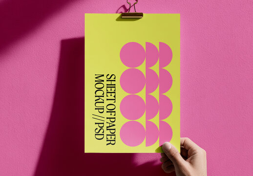 Hand Holding Poster Sheet Mockup