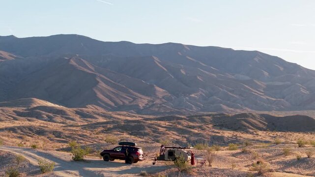 Enjoy aerial views of a teardrop camper and SUV exploring Anza Borego Desert State Park in California along the Thimble Trail.