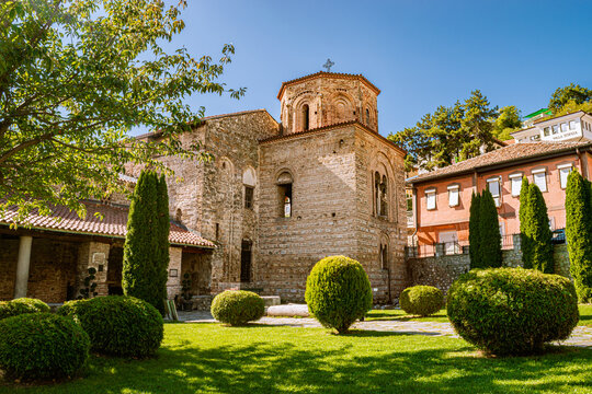 Historic Orthodox Church of Hagia Sophia  with Green Garden on a Sunny Day. Ohrid, North Macedonia