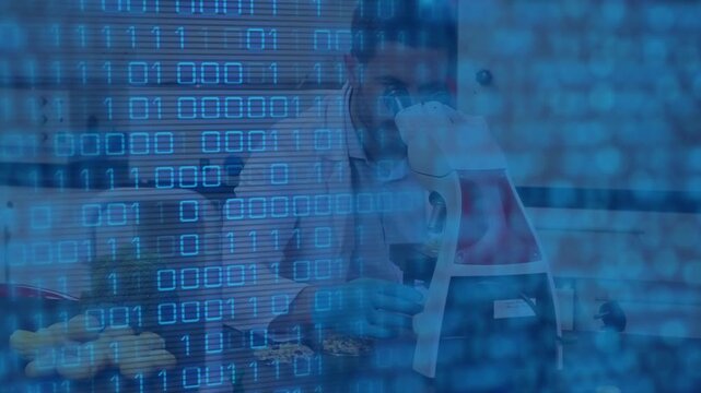 Animation of data processing over caucasian male scientist using microscope in lab