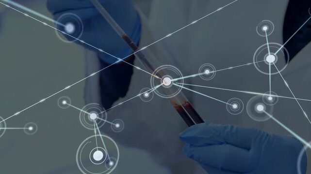 Lab tech drawing liquid with pipette contact causing rings forming translucent network over hands