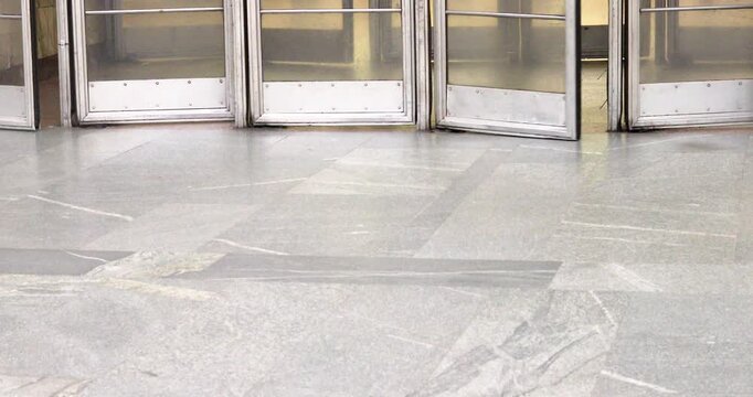 Exiting a door in a public place.