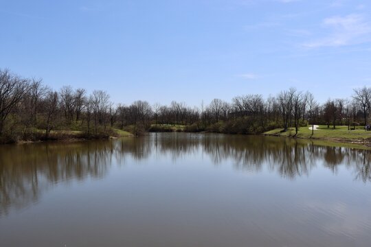 The peaceful lake in the country on a sunny day.