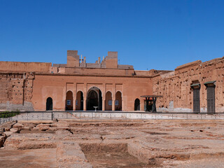 Fototapeta premium Palais El Badi facade with arched entrances and ruined walls in Marrakesh Morocco