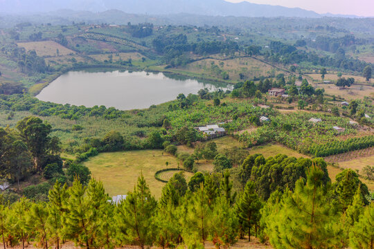 Crater lake and farmland landscape near Fort Portal in western Uganda