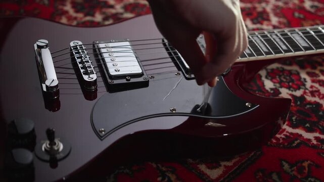 removing removing protective film from new red sg guitar pickguard unpacking