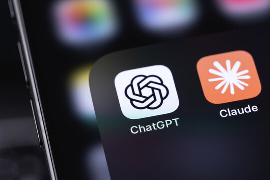 Claude by Anthropic, ChatGPT by OpenAI mobile icon apps on a screen smartphone iPhone. Claude and ChatGPT are the leading AI chatbots and large language models (LLMs). Batumi, Georgia - March 19, 2026