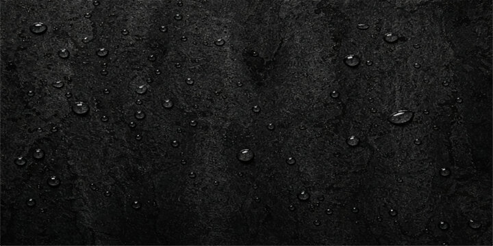 A dark grunge background of rain drops on a textured grey window surface with a rough stone pattern and macro macro concrete material