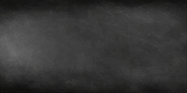 Empty blank blackboard with chalk on a dark vintage grunge texture wall for a dirty old chalkboard design backdrop
