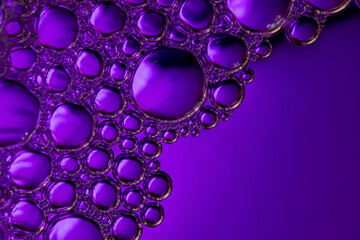 Close-up of purple bubbles, abstract background.