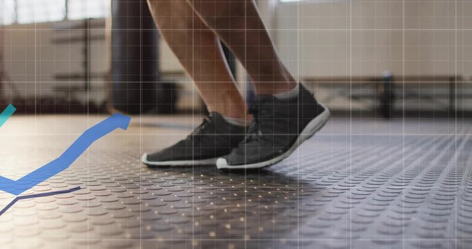 Male athlete initiating drop, performing hops on fitness floor with animated overlay tracking reps