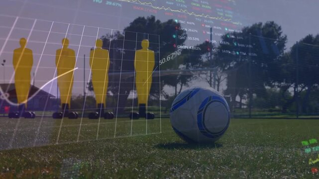 Male player running from left planting and kicking ball while training overlays aligning dummies