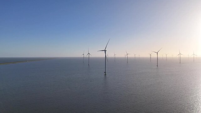Drone pass with Afsluitdijk and offshore wind farm in view