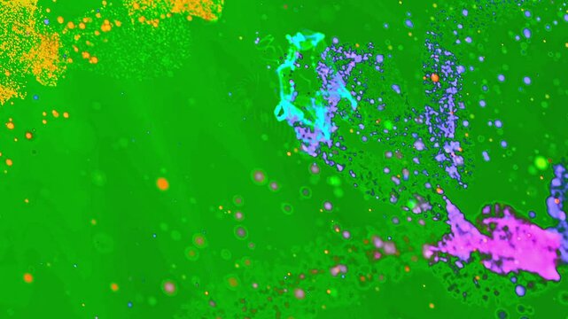 Particles vibrant green surface with scattered colorful paint splatters in blue, purple, pink, orange, and yellow hues, creating a dynamic abstract pattern.