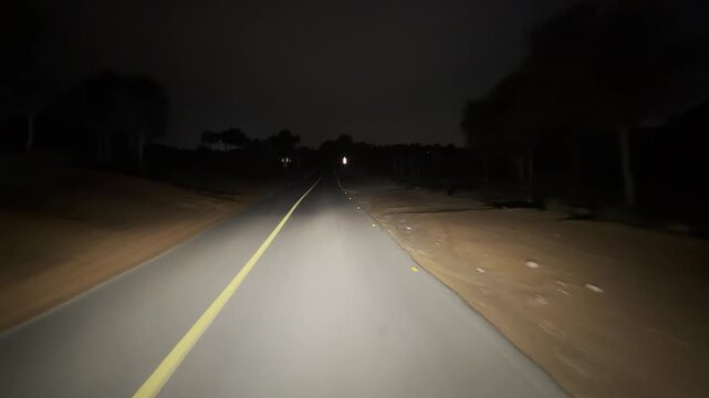 Night road. The road through middle of the desert in UAE