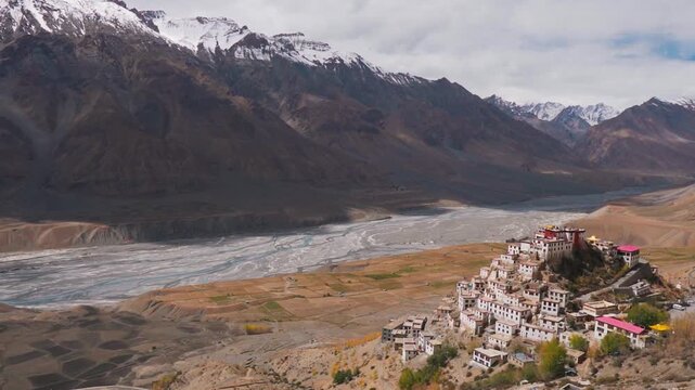 Kee monastery located on top of a hill in Spiti valley, Himachal Pradesh, India. Beautiful mountain landscape with river tributaries and Buddhist monastery. Ancient Buddhist monastery in India.