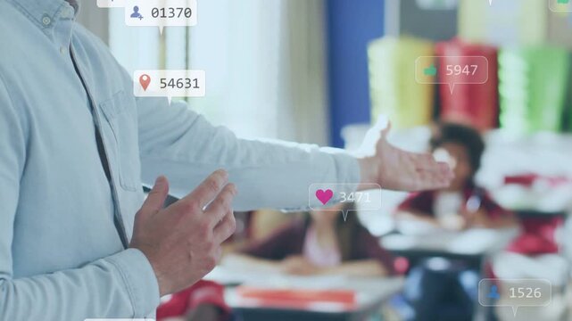 Teacher speaking, gesturing in classroom, with social icons circling hands, engaging class