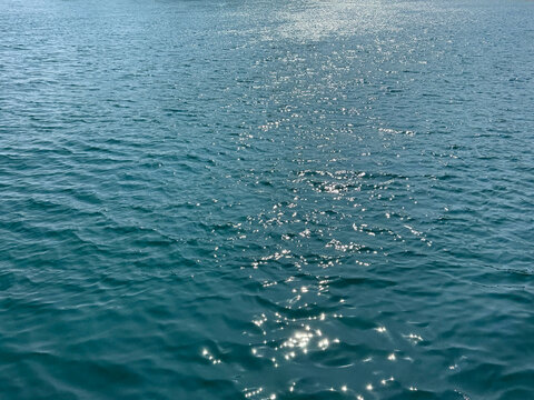 Rippling ocean blue calm water.