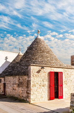 beautiful traditional white houses trulli in italian region Puglia. Trullo is a old masonry house with cone roof with anciant history. World heritage UNESCO
