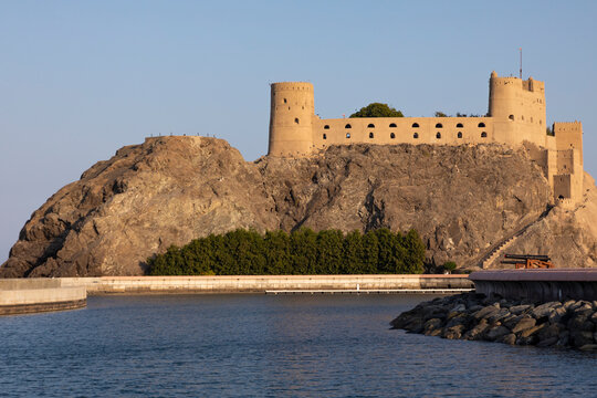 Muttrah Fort and waterfront in Muscat featuring coastal views, traditional buildings, and scenic sea landscape reflecting heritage and urban beauty. 