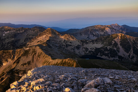 Landscape from the highest peak of Pirin Mountain. View from Vihren summit during sunrise in summer season.