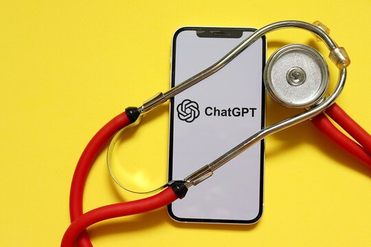 Salvador, Brazil - April 10, 2026: ChatGPT logo and a medical stethoscope. Concept of AI as a virtual doctor and medical consultant. Artificial intelligence in Medicine. 