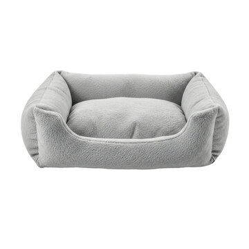 Soft plush grey pet bed isolated on a black background