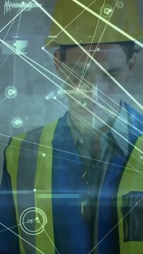 Vertical video: Site lead tapping device scanning AR HUD graphs tracking construction safety data