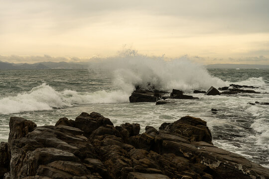 Rocky coastline at Punta Carnero Algeciras Cadiz with crashing waves