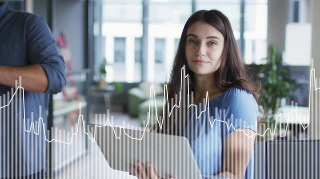 Woman checking laptop for business glancing up causing waveform rising as man with turquoise folder