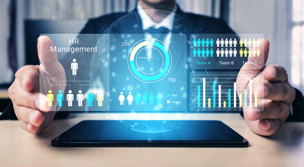 Fototapeta premium Professional setting showcasing a digital interface for HR management with interactive graphs and workforce data, ideal for modern business environments and strategic planning. Ledger