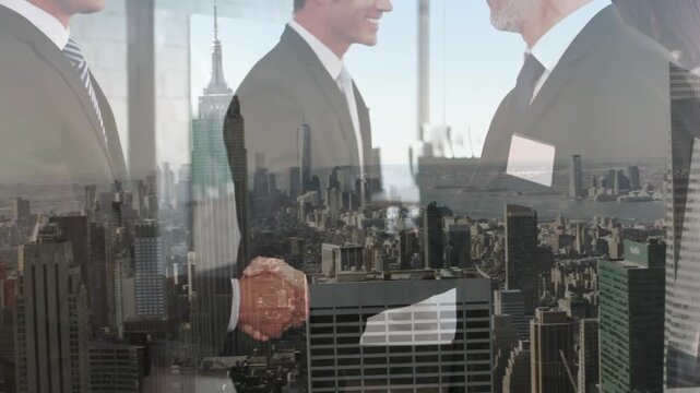 Two businesspeople shaking hands in an office